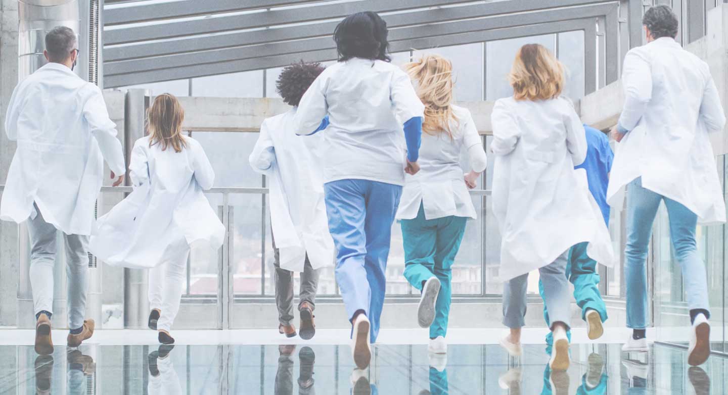 Doctors running to clinic